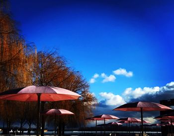 Beach umbrella against blue sky
