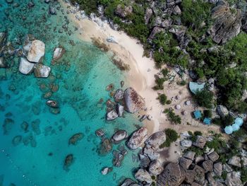 High angle view of sea and rocks