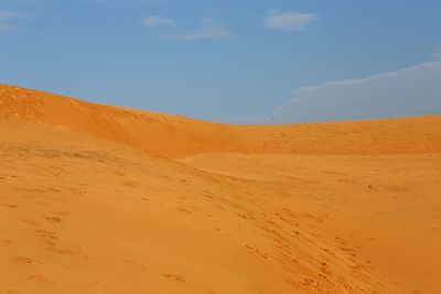 Scenic view of desert against sky