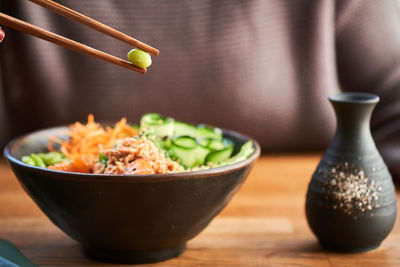 Close-up of chopped vegetables in bowl on table