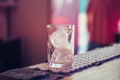 Close-up of beer glass on table