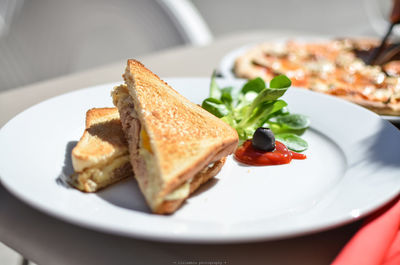 Close-up of breakfast served in plate