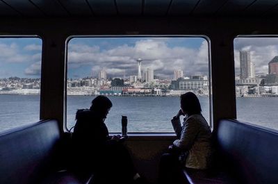 People looking at cityscape