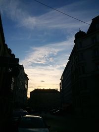 Buildings in city against sky