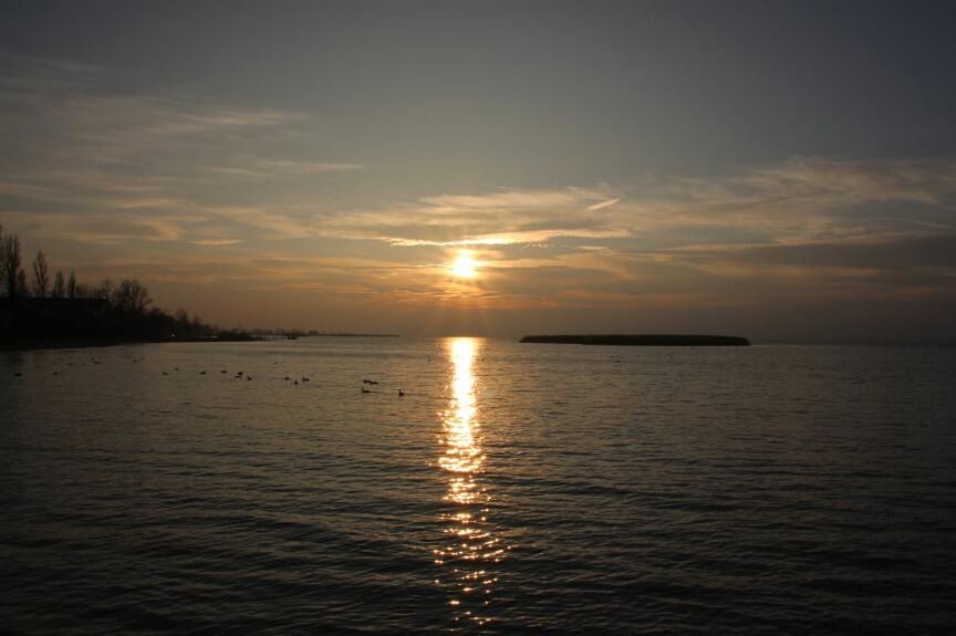 sunset, water, tranquil scene, sun, scenics, sea, tranquility, beauty in nature, sky, reflection, horizon over water, idyllic, orange color, nature, waterfront, cloud - sky, sunlight, silhouette, rippled, cloud