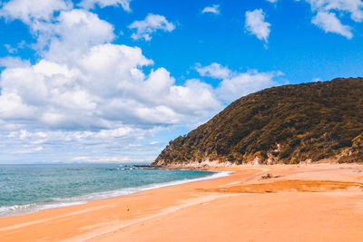 Scenic view of beach against sky