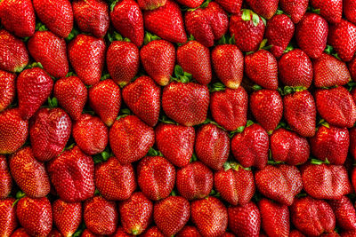 Fresh strawberries arranged at the market