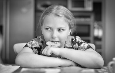 Portrait of cute girl in the kitchen