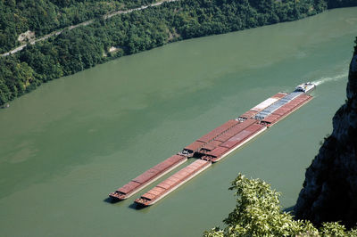 Cargo ship on danube river. cazanele mari gorge between romania and serbia