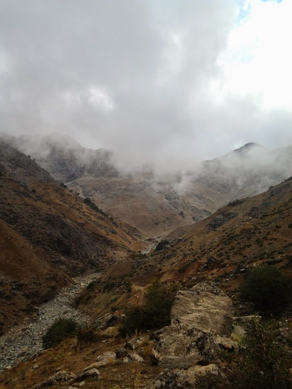 mountain, beauty in nature, scenics - nature, sky, environment, landscape, tranquil scene, cloud - sky, non-urban scene, nature, tranquility, day, mountain range, no people, remote, land, physical geography, outdoors, travel, mountain peak