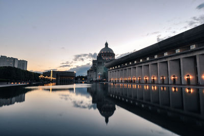 Reflection of building on river