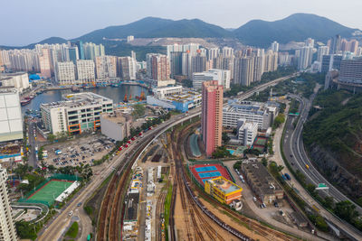 High angle view of street amidst buildings in city