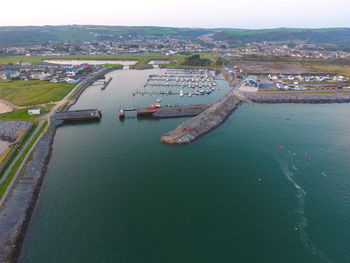 High angle view of boats in city