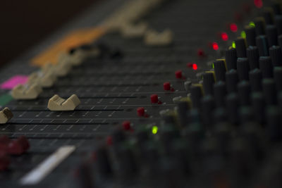 Close-up of sound mixer at music concert