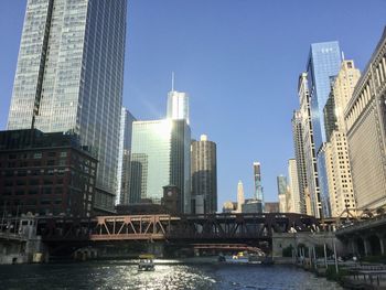 Modern buildings in city against sky