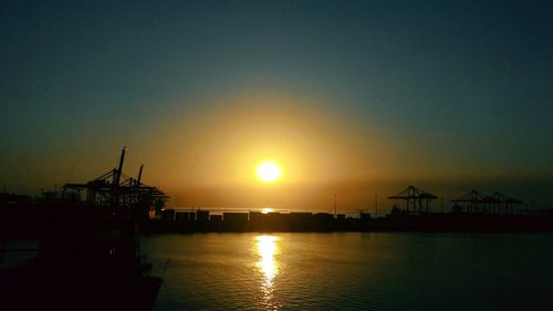 Scenic view of sea at sunset