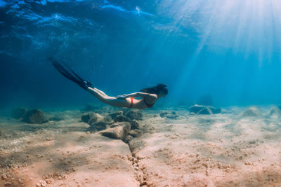 Man swimming in sea