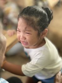 Close-up of cute baby boy outdoors