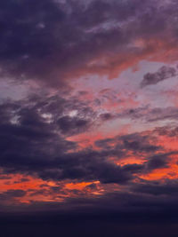 Low angle view of dramatic sky during sunset