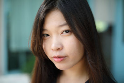 Close-up portrait of beautiful young woman