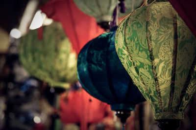 Close-up of lanterns hanging outdoors