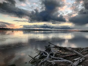 Scenic view of sea against sky at sunset