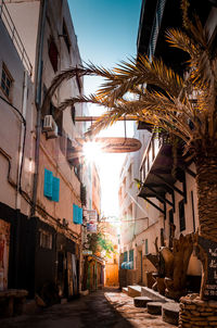 Street amidst buildings against sky