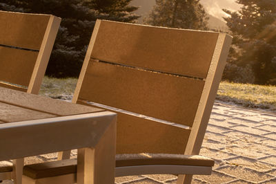 Close-up of empty chair on field