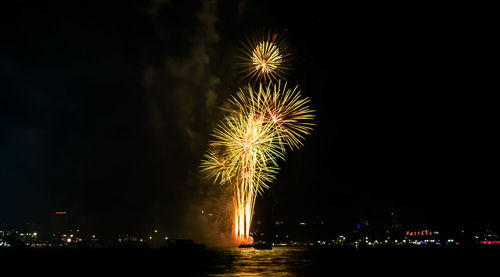 Firework display at night