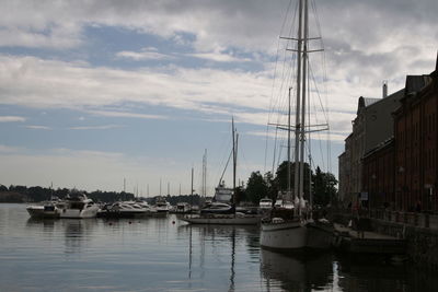 Boats moored in sea