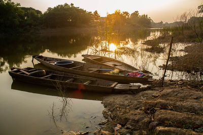 Boat moored in lake