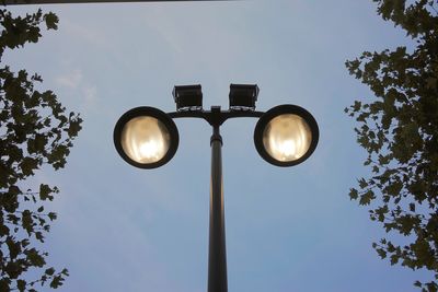 Low angle view of street light against sky