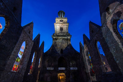 Low angle view of cathedral against blue sky