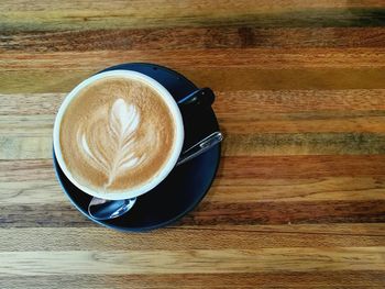 High angle view of cappuccino on table