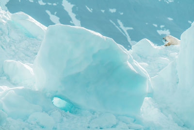 Full frame shot of ice floating on swimming pool