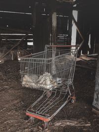 Abandoned shopping cart in container