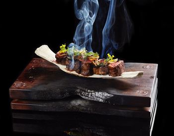 Close-up of food against black background