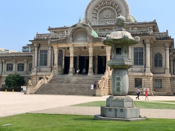 Statue of historic building against clear sky