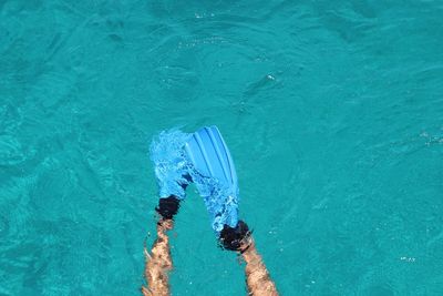 Close-up of person swimming in pool