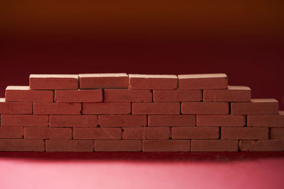 Close-up of wooden blocks against white background