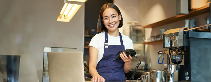 Young woman using mobile phone