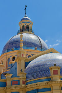 Low angle view of church against clear blue sky