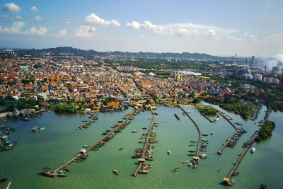 High angle view of townscape against sky in city