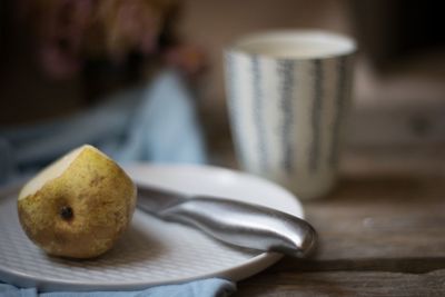 Close-up of bread in plate on table