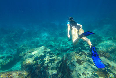 Man swimming in sea