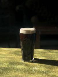 Close-up of coffee cup on table