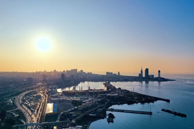 High angle view of city buildings during sunset