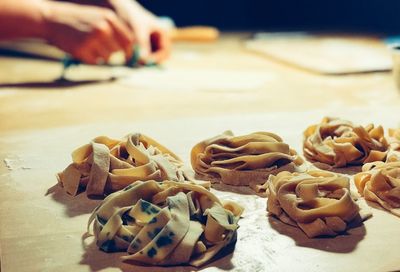 Close-up of preparing food on table