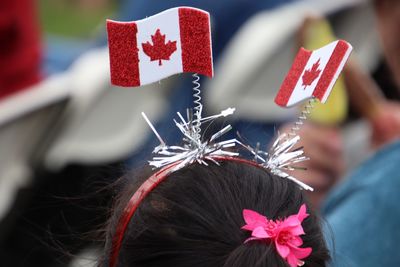 Close-up of canadian flag on headband