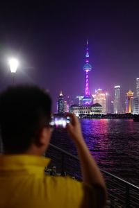 View of city lit up at night